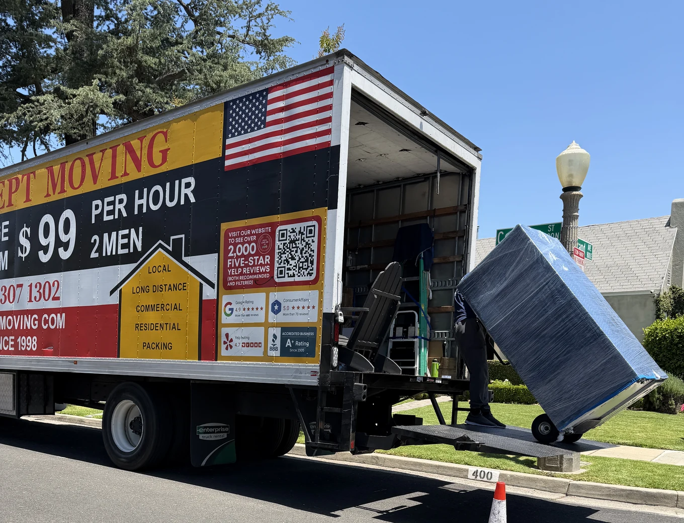 Adept Moving wrapped furniture loaded onto liftgate in Alhambra