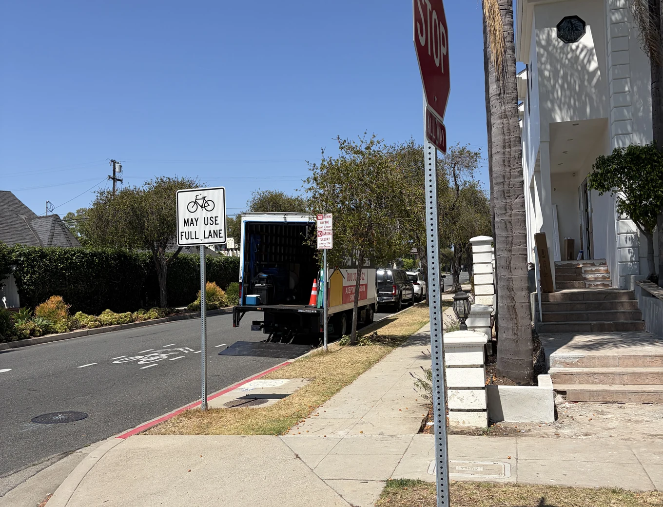 Adept Moving truck on North Palm Drive in Beverly Hills, 90210