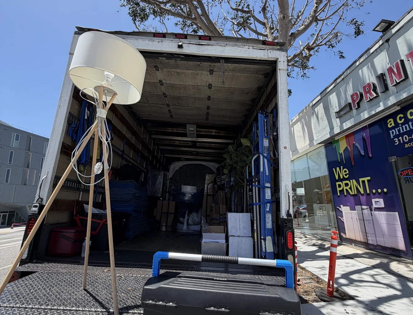 Adept mover loading a floor lamp onto the truck liftgate in Los Angeles, 90025