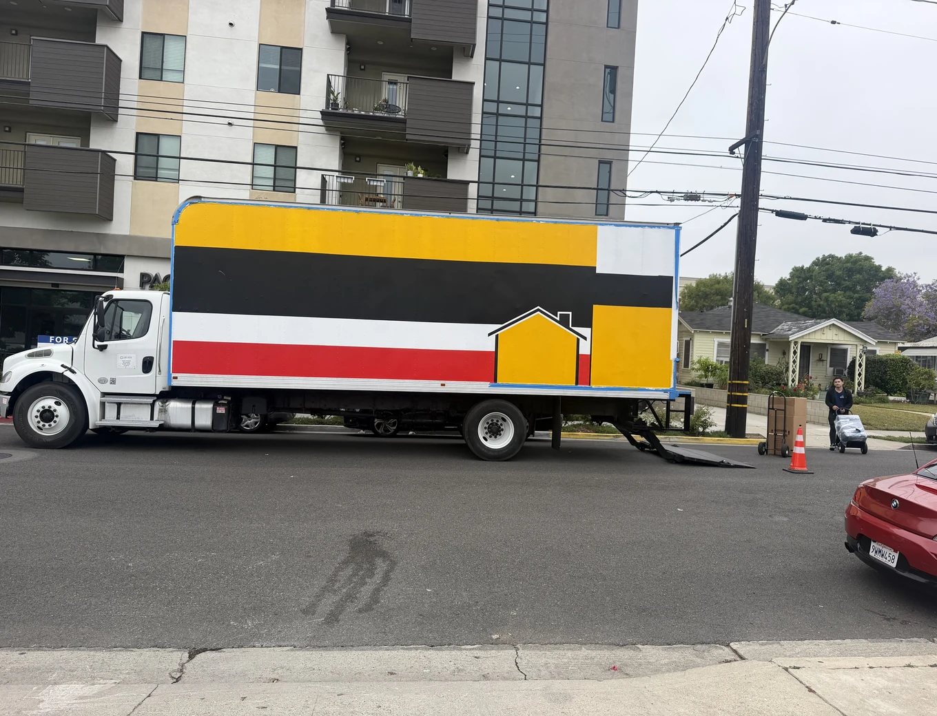 Adept Moving branded box truck, side view, on North Chandler Avenue in Monterey Park, 91755