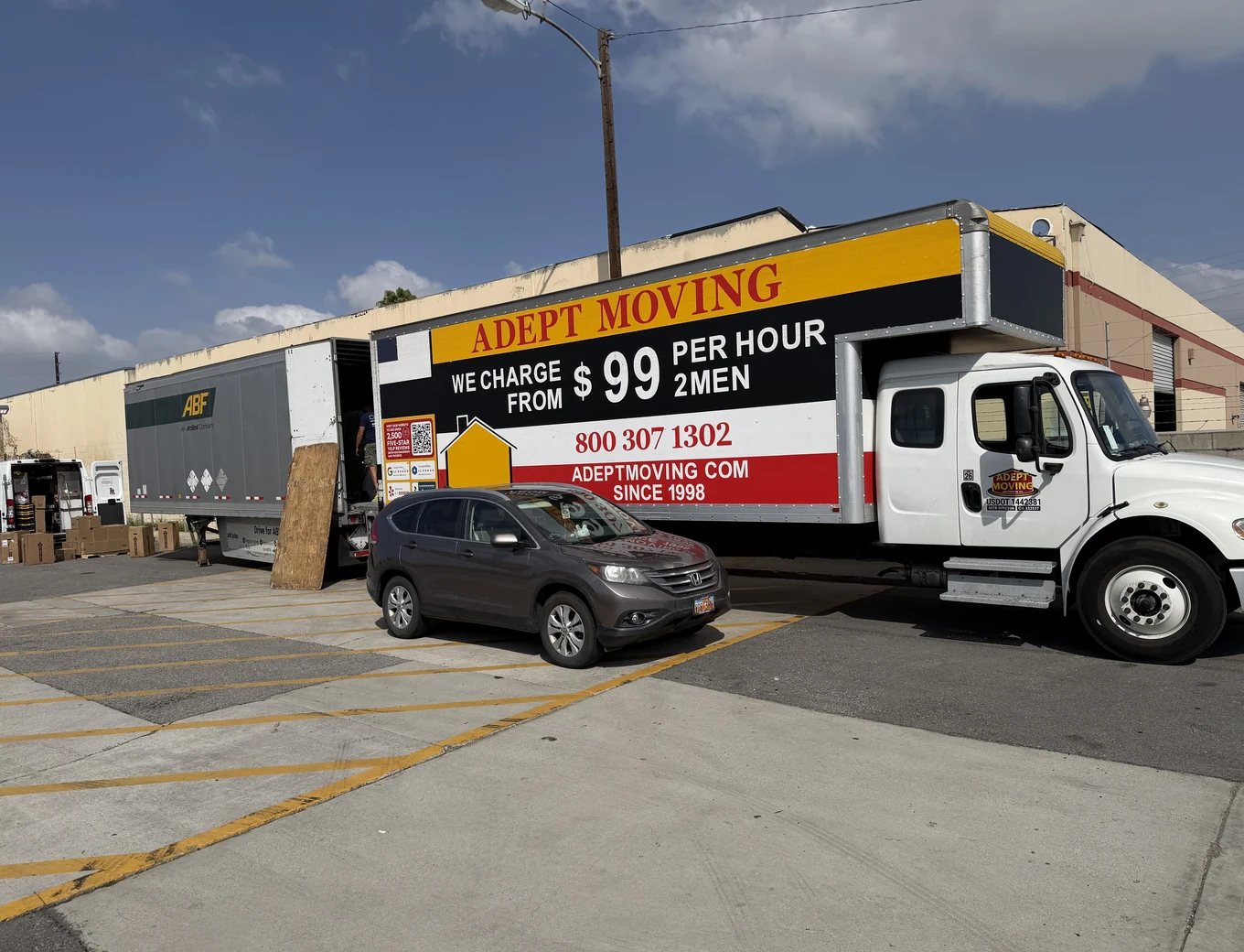 Adept Moving $99 branded box truck in an industrial lot on Industry Avenue in Pico Rivera, 90660