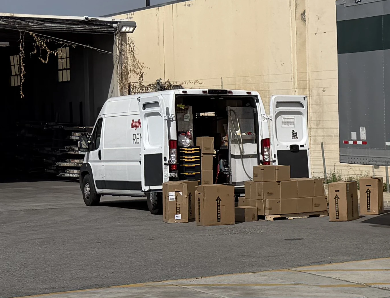Adept moving van loaded with packed boxes at a job on Industry Avenue in Pico Rivera, 90660