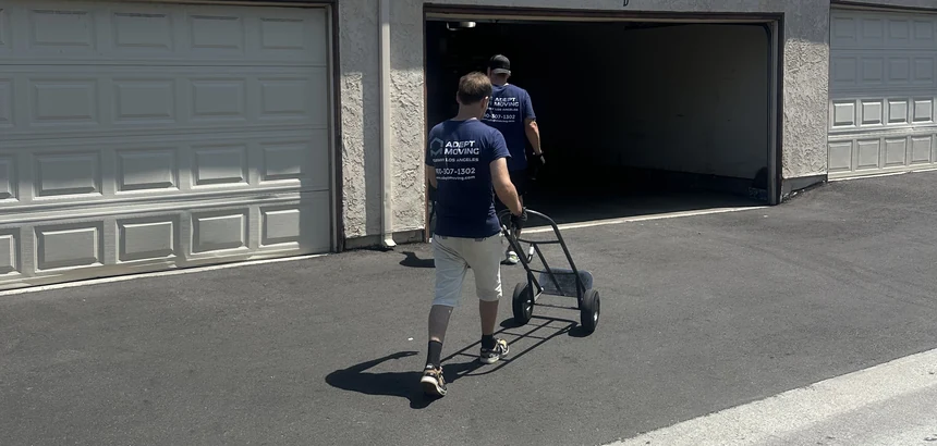 Adept mover with a hand truck at an apartment garage in San Dimas, 91773