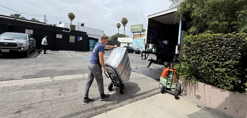 Adept Moving mover with a hand truck on Matilija Avenue in Sherman Oaks, 91423