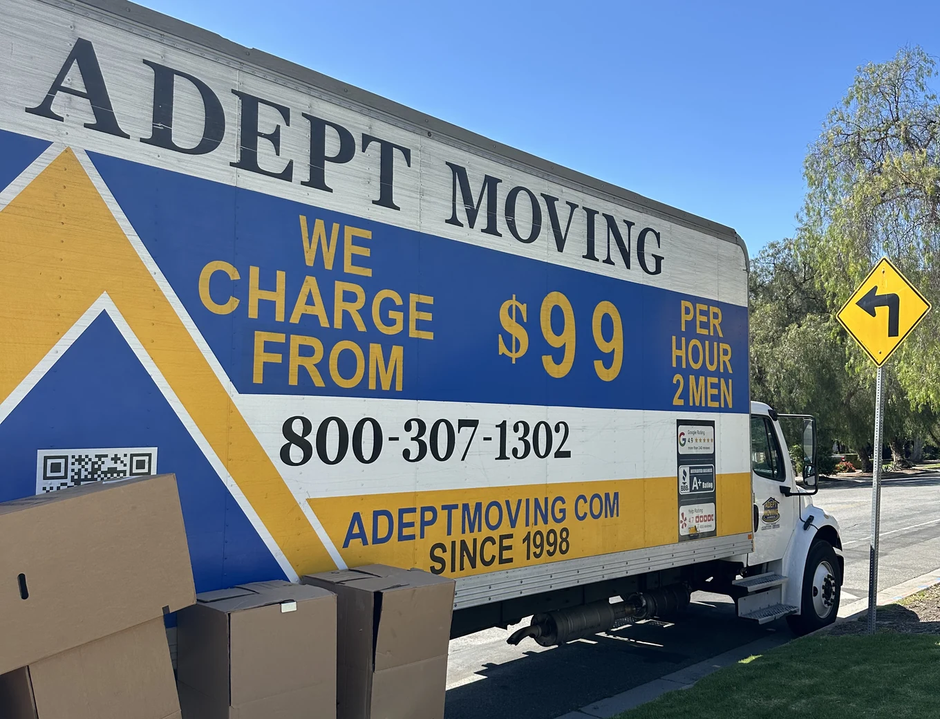 Adept Moving $99 per hour branded truck with boxes in Woodland Hills