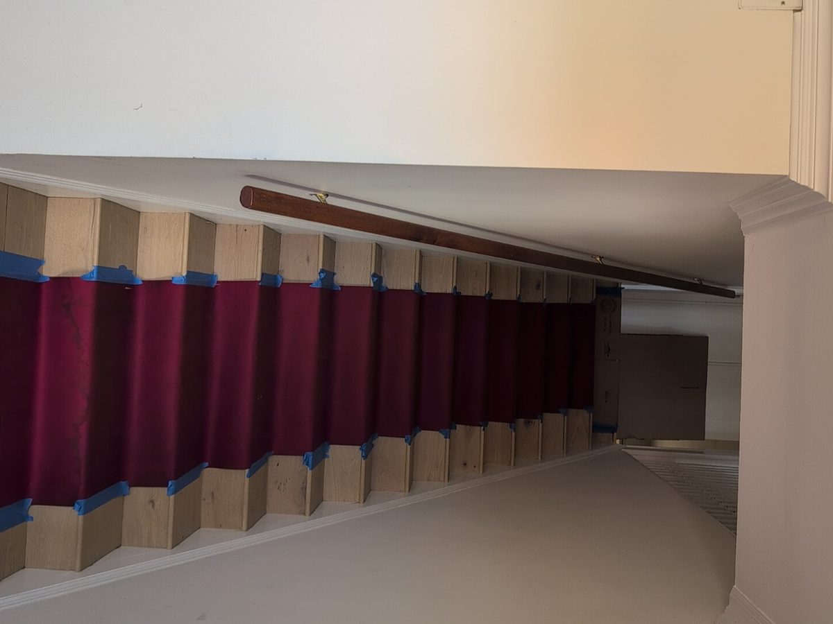 Staircase covered with protection before the Adept Moving crew carried furniture down