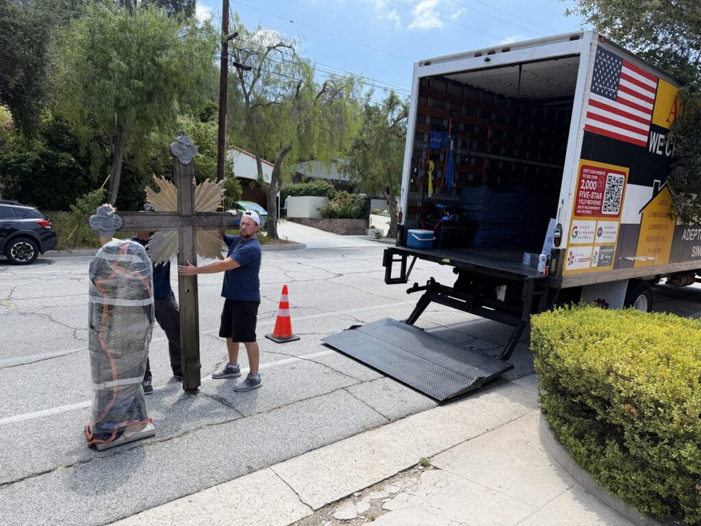 Move of a stone statue and an oversized wooden cross from Grand Avenue to Forest Avenue in South Pasadena